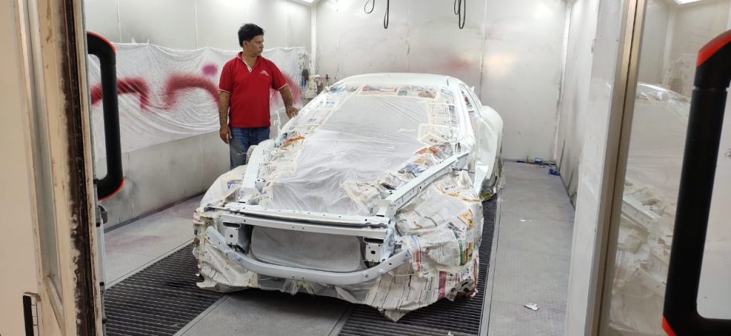 Car Painting Work in Paint Booth