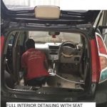 Car interior vacuum and dashboard cleaning by Mars Auto Care technicians
