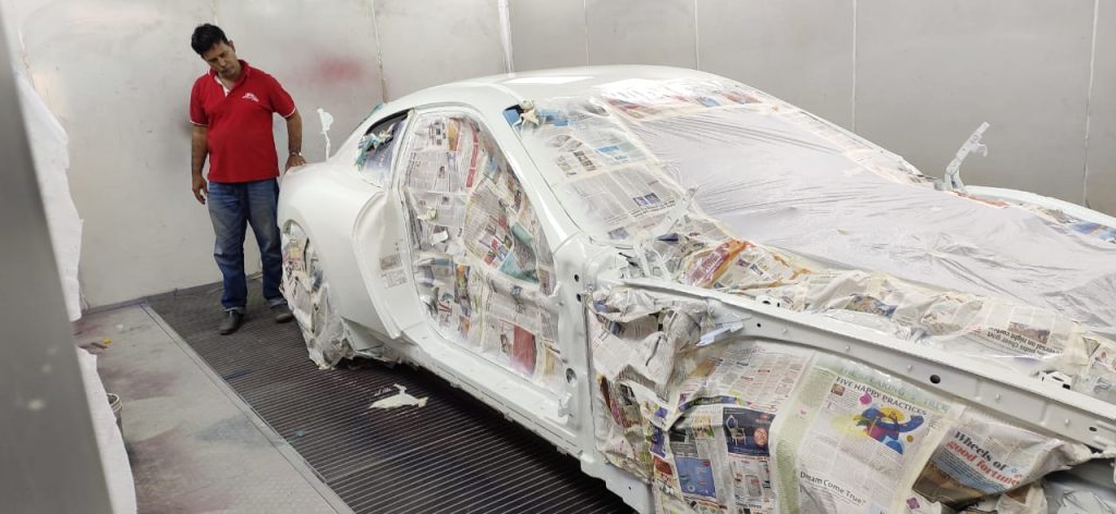 Car Painting Work in Paint Booth