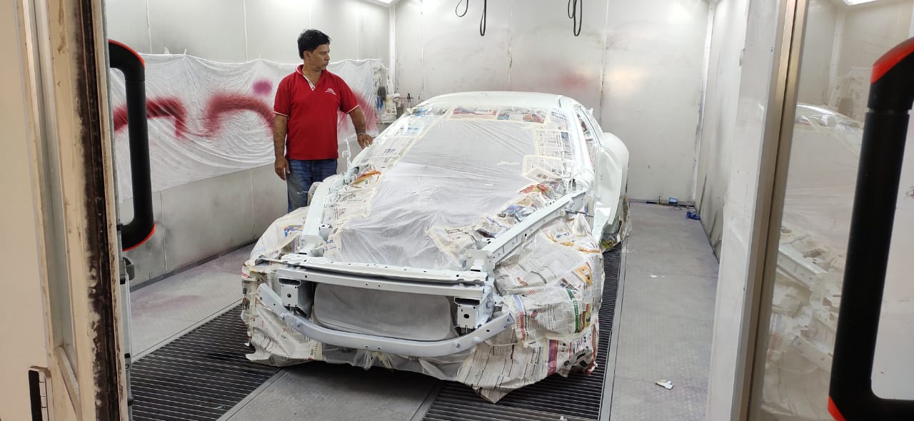 Car Painting Work in Paint Booth
