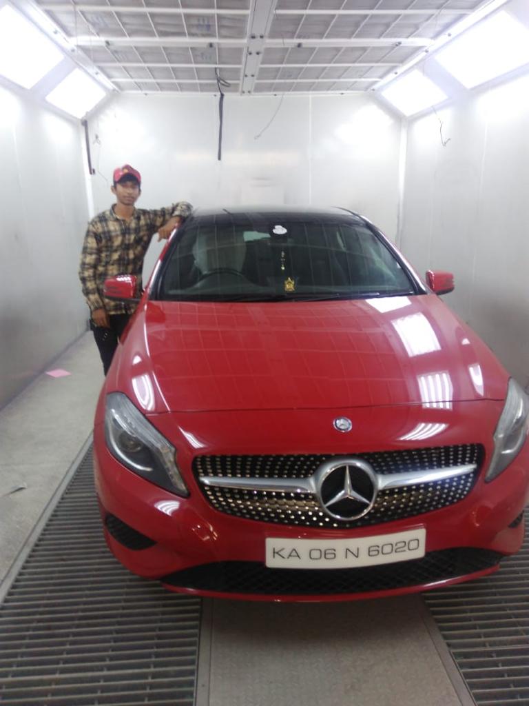 Car Painting Work in Paint Booth