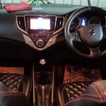Car interior vacuum and dashboard cleaning by Mars Auto Care technicians