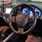 Car interior vacuum and dashboard cleaning by Mars Auto Care technicians