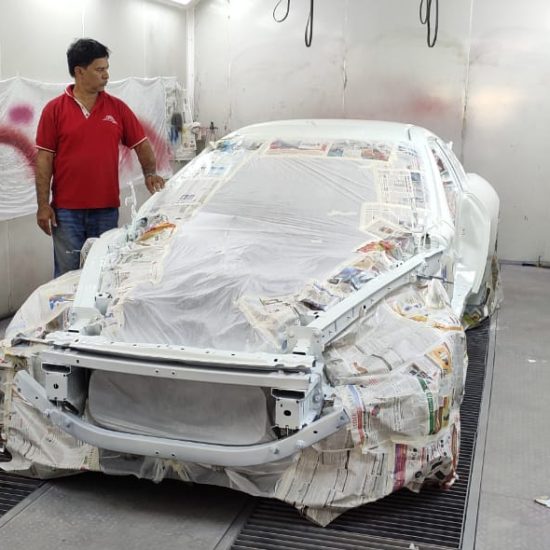 Car Painting Work in Paint Booth